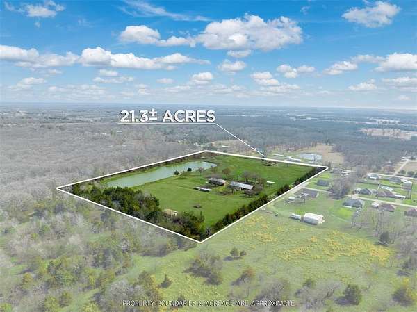 21 Acres of Agricultural Land with Home for Sale in Powderly, Texas