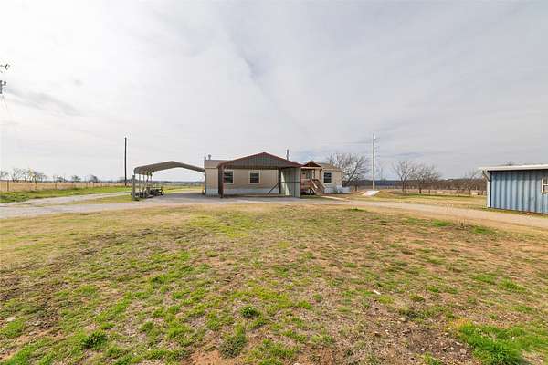 6.26 Acres of Land with Home for Sale in Decatur, Texas