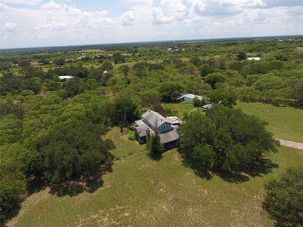 15 Acres of Land with Home for Sale in Mullin, Texas