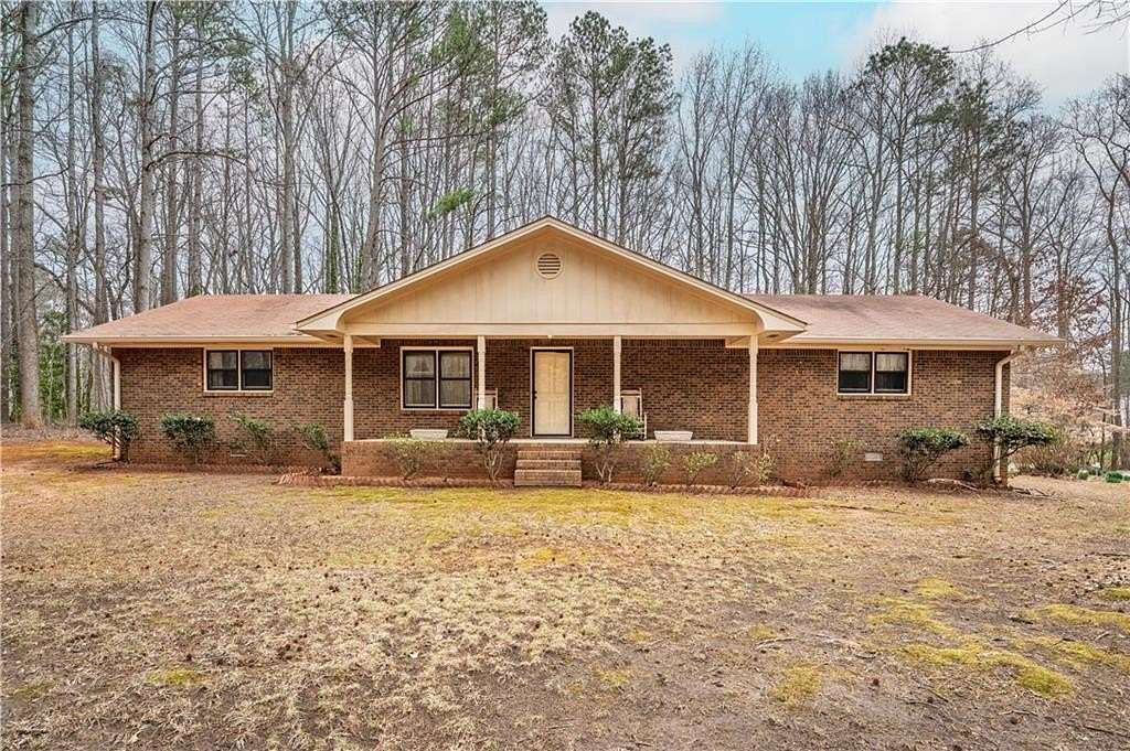 6.7 Acres of Land with Home for Sale in Mableton, Georgia