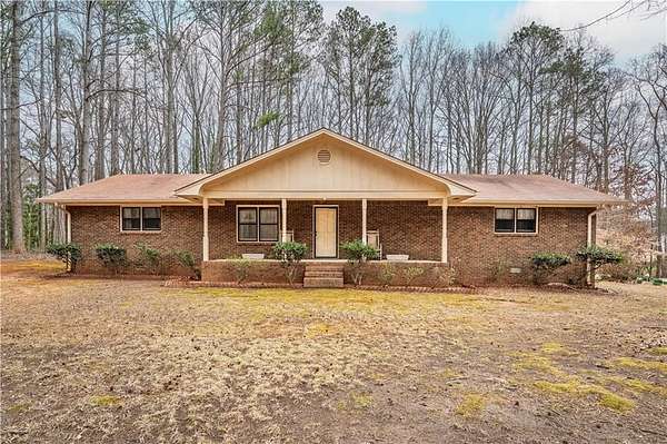 6.7 Acres of Land with Home for Sale in Mableton, Georgia