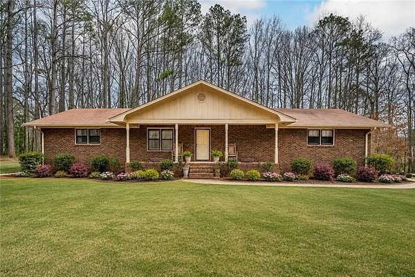 6.7 Acres of Land with Home for Sale in Mableton, Georgia
