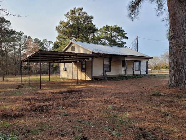 5 Acres of Residential Land with Home for Sale in Detroit, Texas