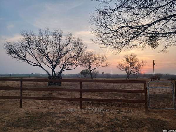 10.2 Acres of Land with Home for Sale in Floresville, Texas
