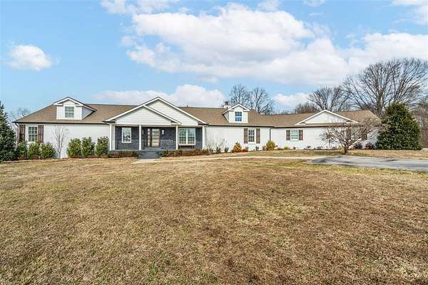 7.83 Acres of Land with Home for Sale in Scottsville, Kentucky