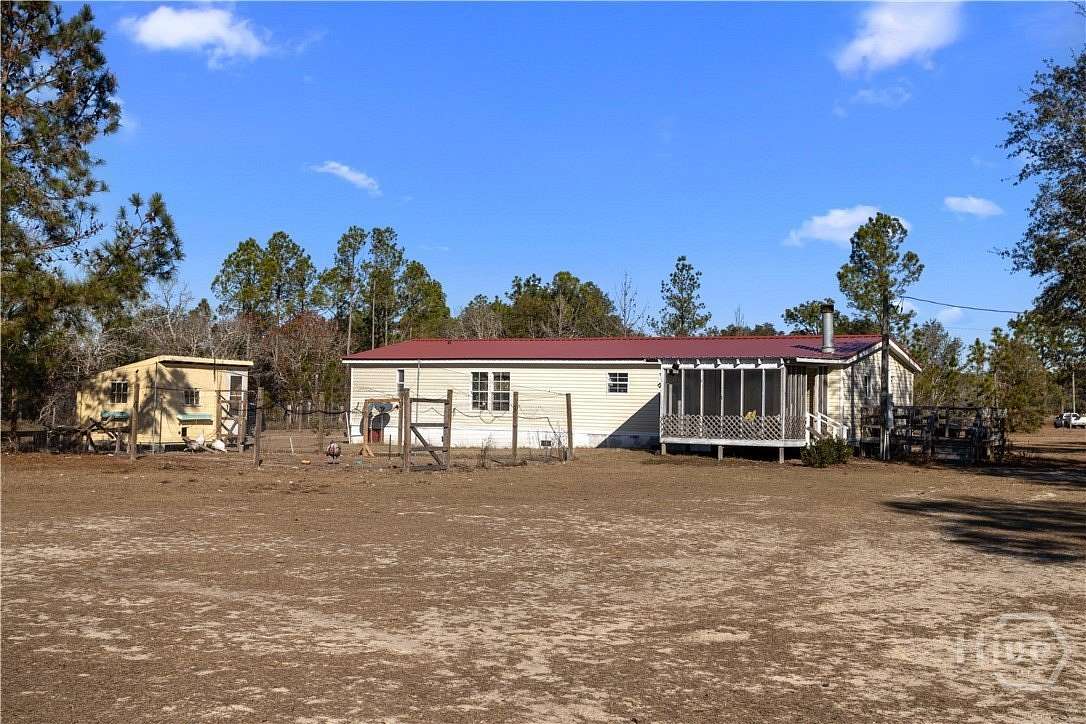 3.65 Acres of Residential Land with Home for Sale in Collins, Georgia