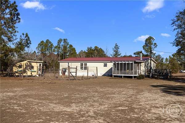 3.65 Acres of Residential Land with Home for Sale in Collins, Georgia