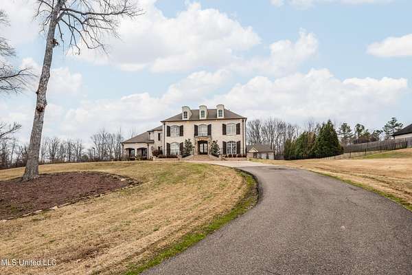 5 Acres of Residential Land with Home for Sale in Olive Branch, Mississippi