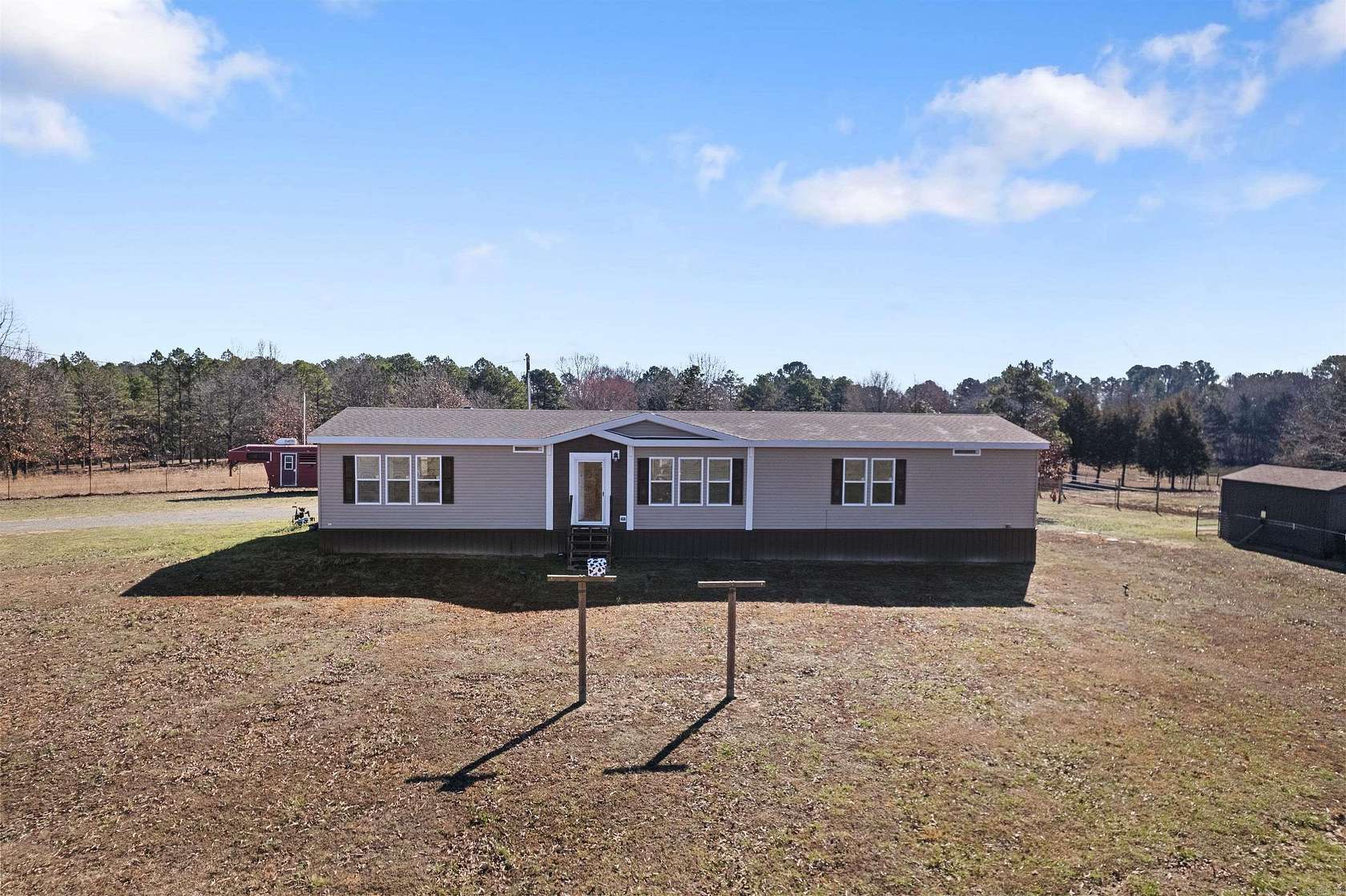 10 Acres of Land with Home for Sale in Romance, Arkansas