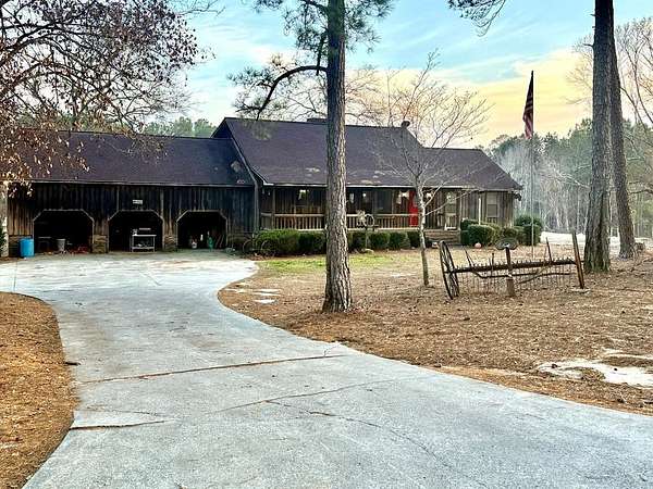 11.8 Acres of Land with Home for Sale in Wrightsville, Georgia