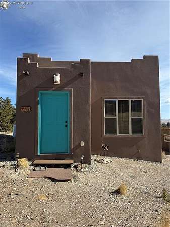 5 Acres of Residential Land with Home for Sale in Hartsel, Colorado