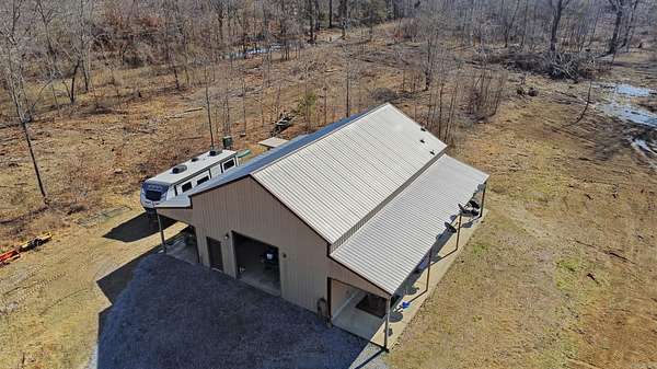 183 Acres of Recreational Land with Home for Sale in Perryville, Arkansas