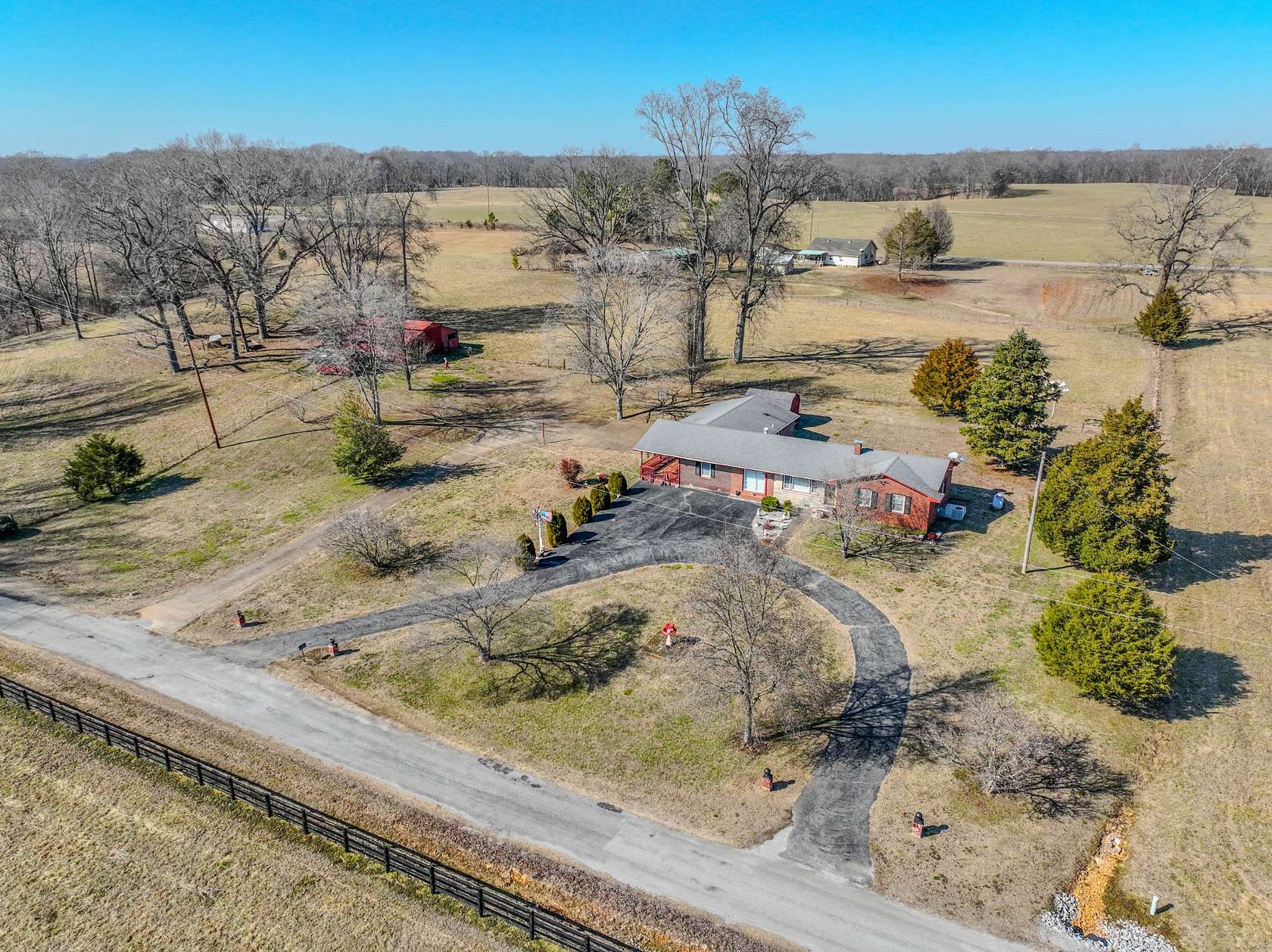 4.49 Acres of Residential Land with Home for Auction in Loretto, Tennessee