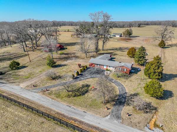 4.49 Acres of Residential Land with Home for Auction in Loretto, Tennessee