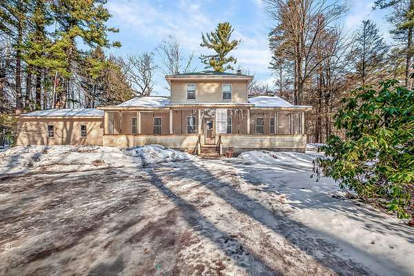 10.7 Acres of Land with Home for Sale in Montague, Michigan