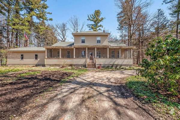 10.7 Acres of Land with Home for Sale in Montague, Michigan