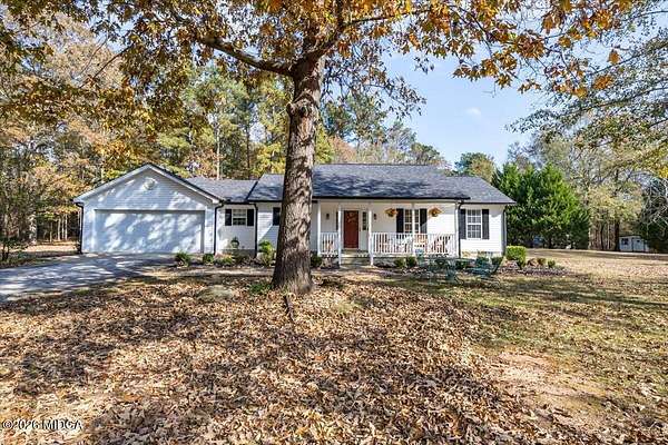 3.3 Acres of Residential Land with Home for Sale in Forsyth, Georgia