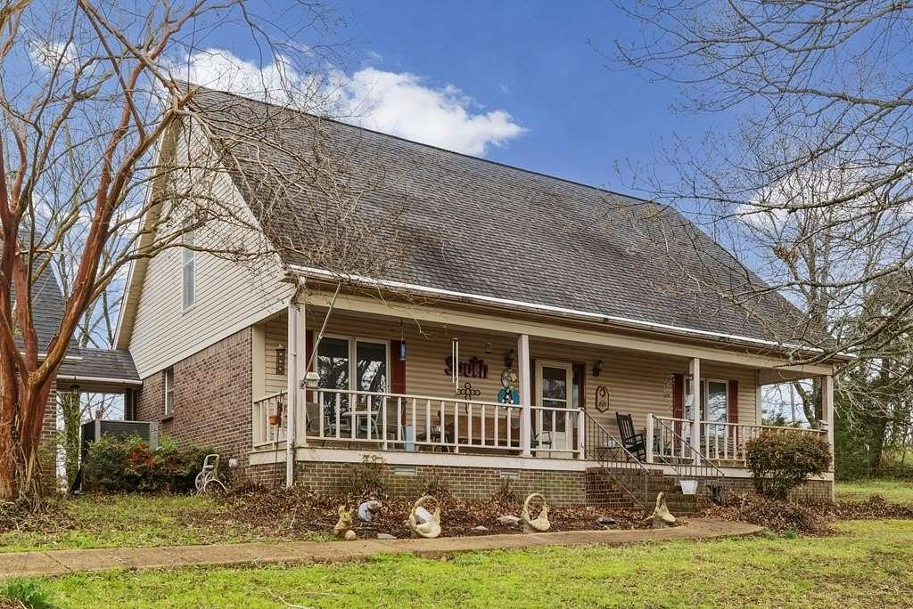 28.4 Acres of Land with Home for Sale in Batesville, Mississippi
