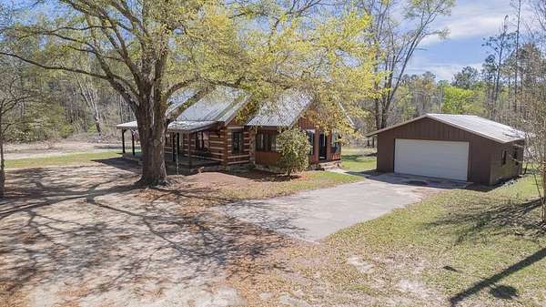 6.45 Acres of Land with Home for Sale in Alamo, Georgia