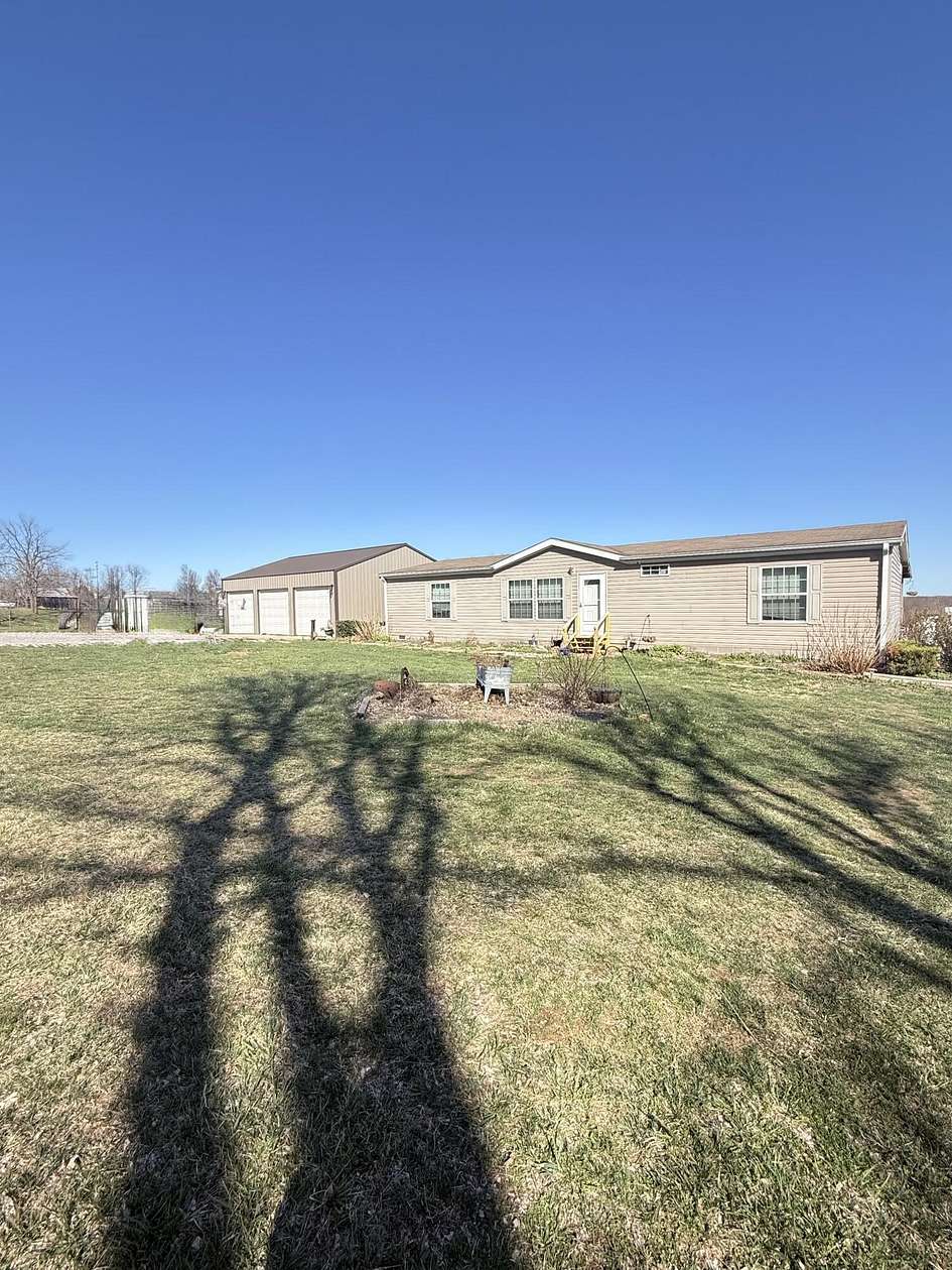 6 Acres of Land with Home for Sale in Waynesburg, Kentucky