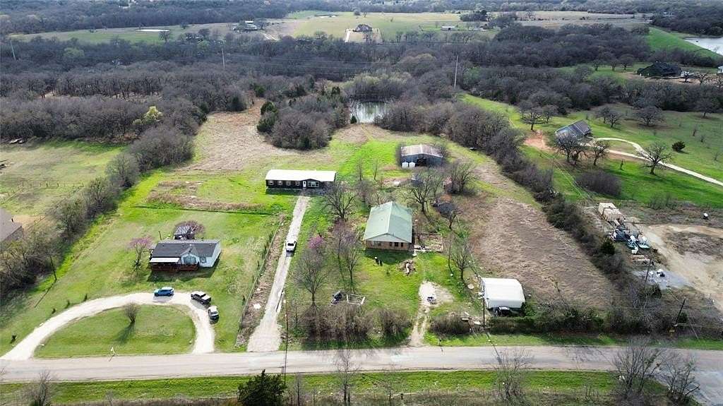 12 Acres of Land with Home for Sale in Grandview, Texas