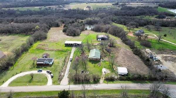 12 Acres of Land with Home for Sale in Grandview, Texas