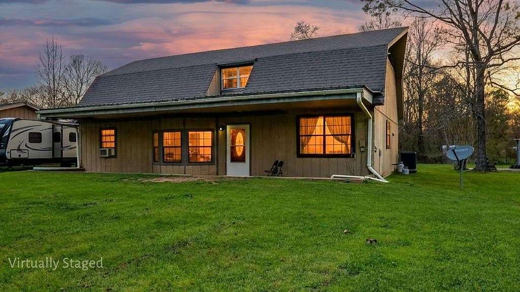 6.46 Acres of Land with Home for Sale in Woodville, Texas