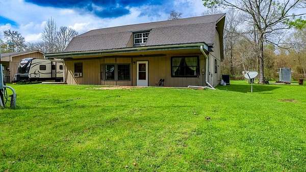 6.46 Acres of Land with Home for Sale in Woodville, Texas