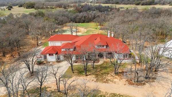 5 Acres of Land with Home for Sale in Weatherford, Texas