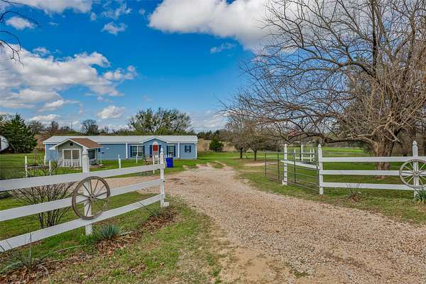 5 Acres of Land with Home for Sale in Gainesville, Texas