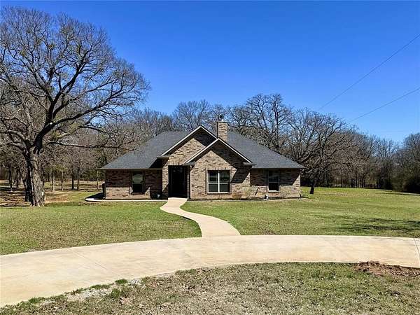 3.73 Acres of Land with Home for Sale in Bryson, Texas