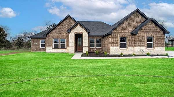 1.5 Acres of Land with Home for Sale in Greenville, Texas