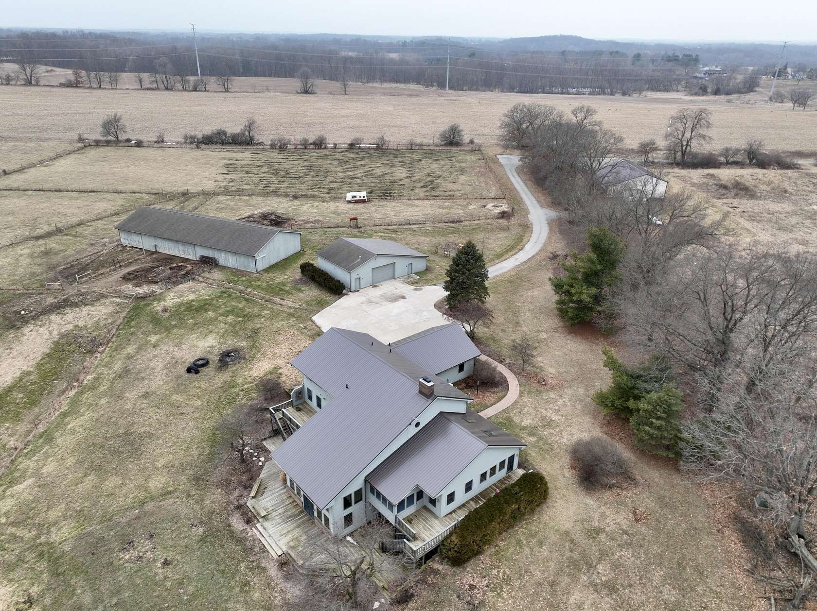 27.9 Acres of Agricultural Land with Home for Sale in Chelsea, Michigan