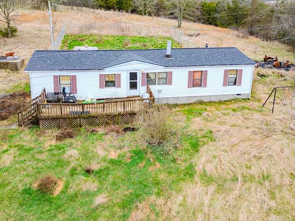 5.19 Acres of Land with Home for Sale in Stamping Ground, Kentucky