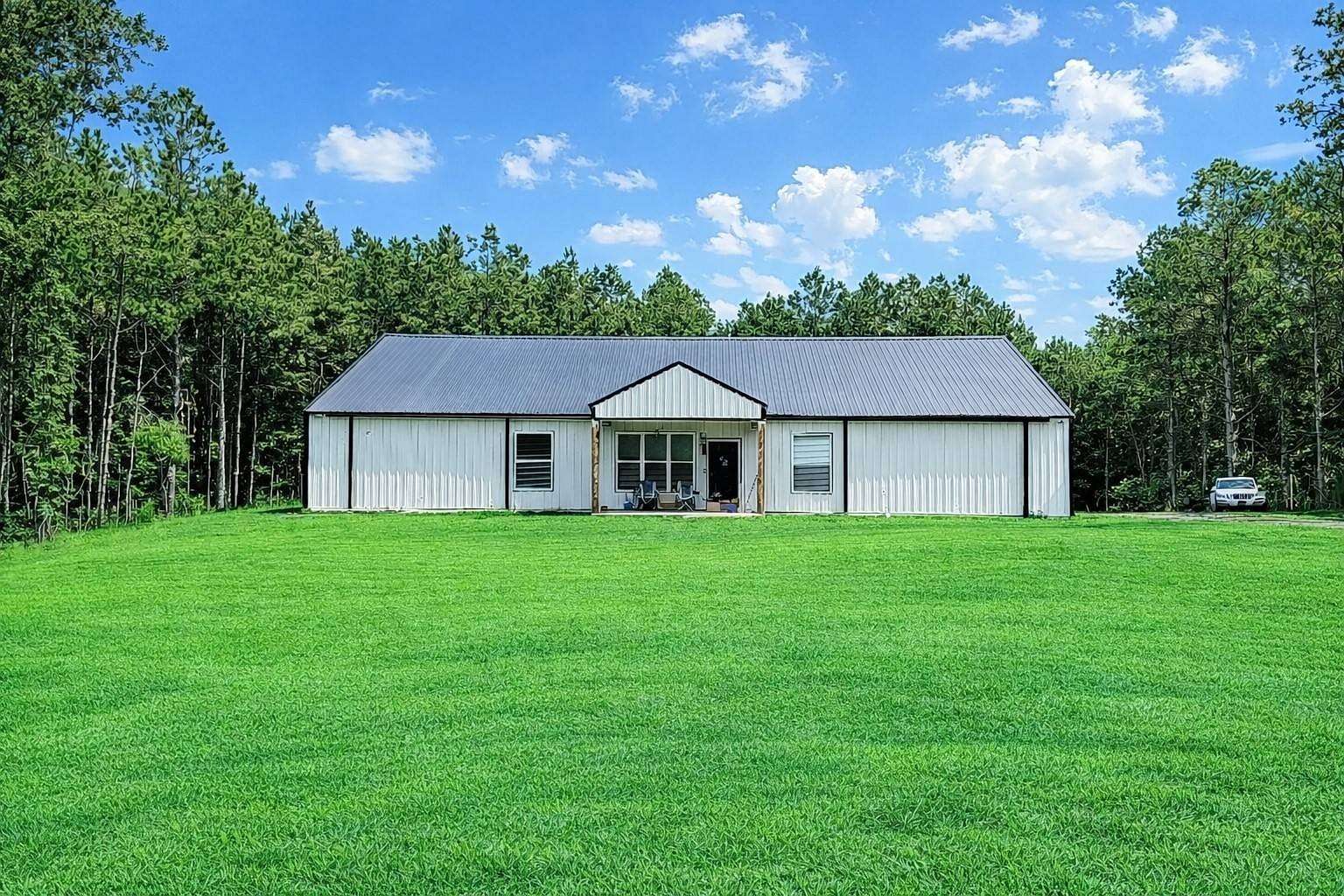 14.4 Acres of Land with Home for Sale in Magnolia, Arkansas