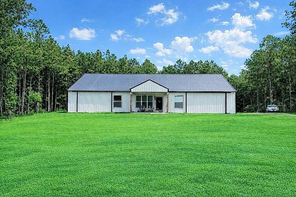 14.4 Acres of Land with Home for Sale in Magnolia, Arkansas
