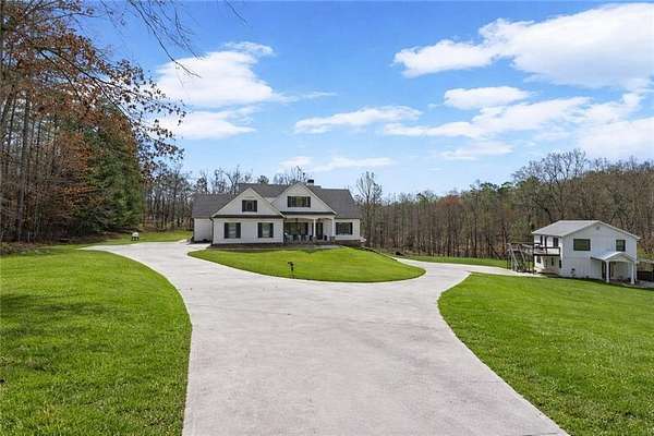 10.4 Acres of Land with Home for Sale in Canton, Georgia