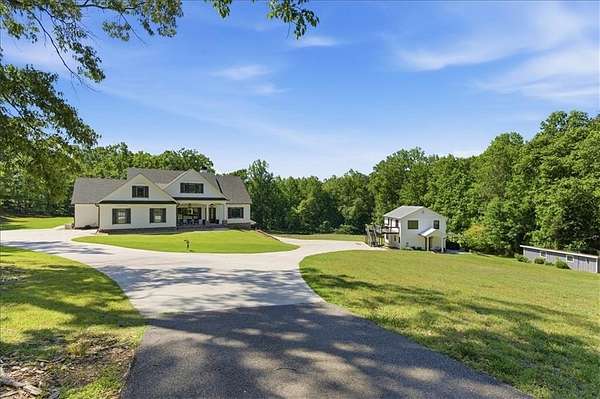 10.4 Acres of Land with Home for Sale in Canton, Georgia