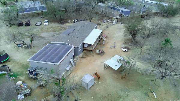 2.12 Acres of Land with Home for Sale in Natalia, Texas