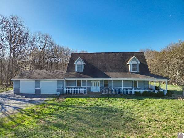 36.2 Acres of Land with Home for Sale in Sedalia, Kentucky