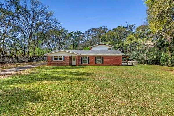 8.3 Acres of Land with Home for Sale in Grand Bay, Alabama
