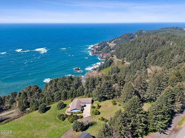 1.76 Acres of Land with Home for Sale in Otter Rock, Oregon