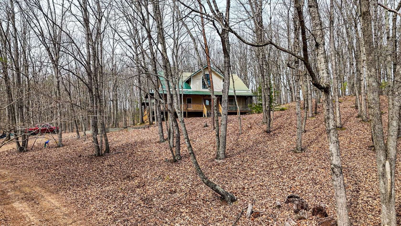 10.7 Acres of Land with Home for Sale in Cleveland, Tennessee