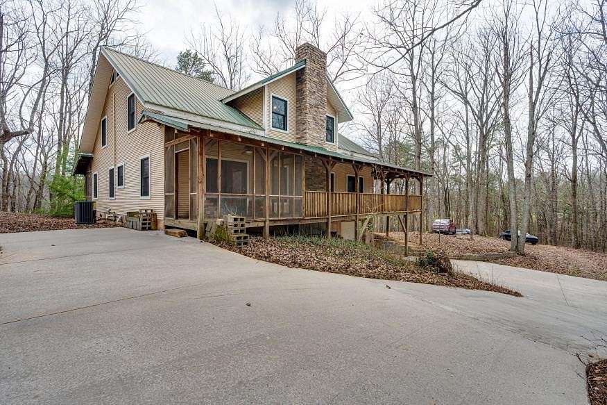 10.7 Acres of Land with Home for Sale in Cleveland, Tennessee