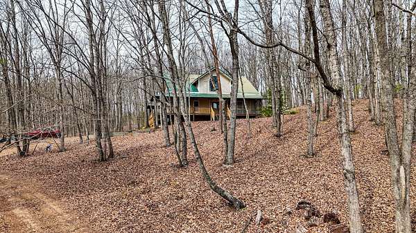 10.7 Acres of Land with Home for Sale in Cleveland, Tennessee