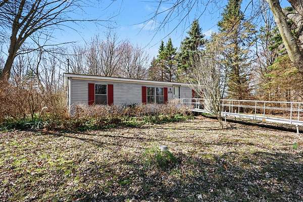 13.1 Acres of Recreational Land with Home for Sale in Fennville, Michigan