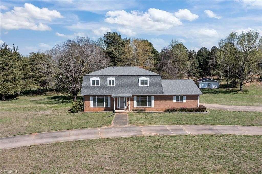 7.2 Acres of Land with Home for Sale in Mooresville, North Carolina