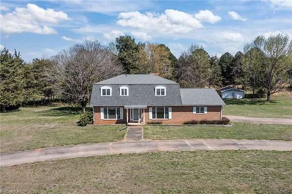 7.2 Acres of Land with Home for Sale in Mooresville, North Carolina