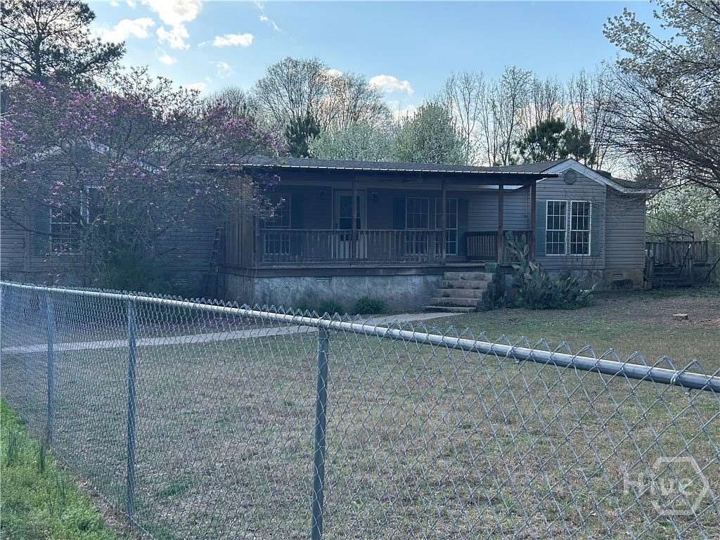 5.6 Acres of Land with Home for Sale in Colbert, Georgia