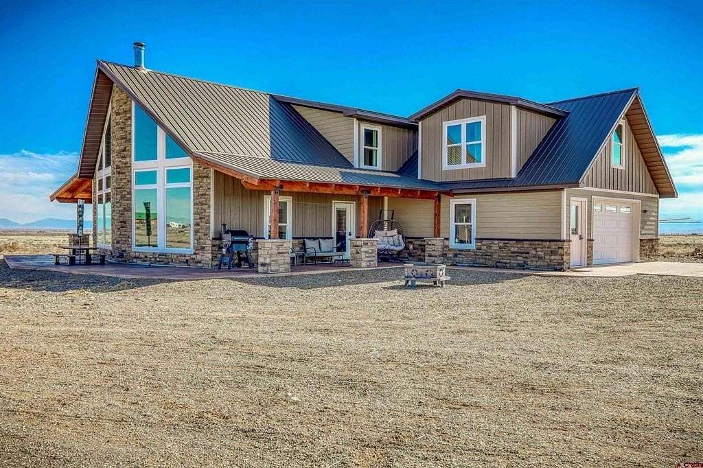 40.6 Acres of Agricultural Land with Home for Sale in La Jara, Colorado